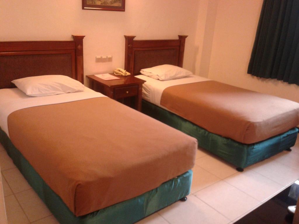 Hotel Fortuna Surabaya Phòng bức ảnh